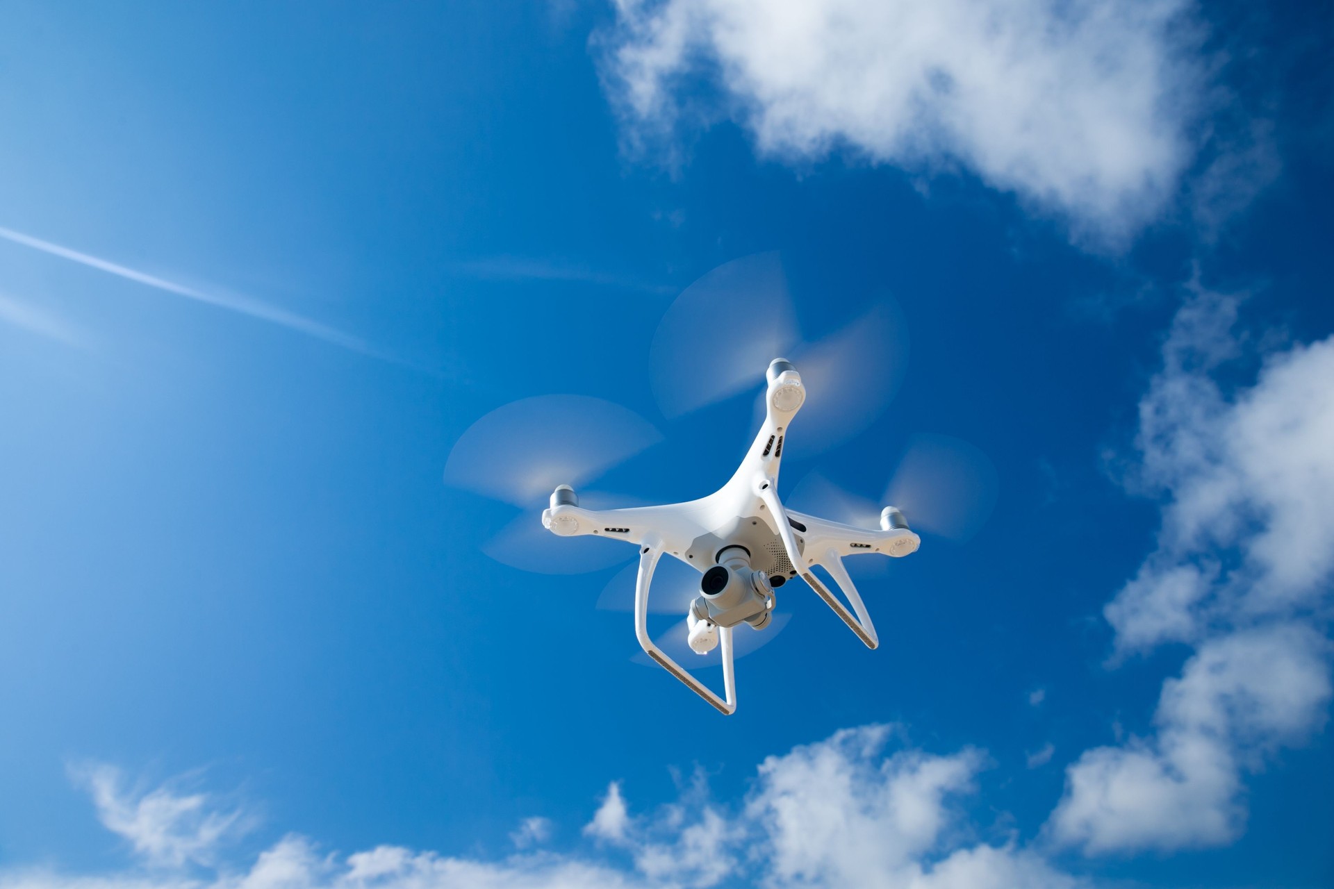 Drone fly in the blue sky